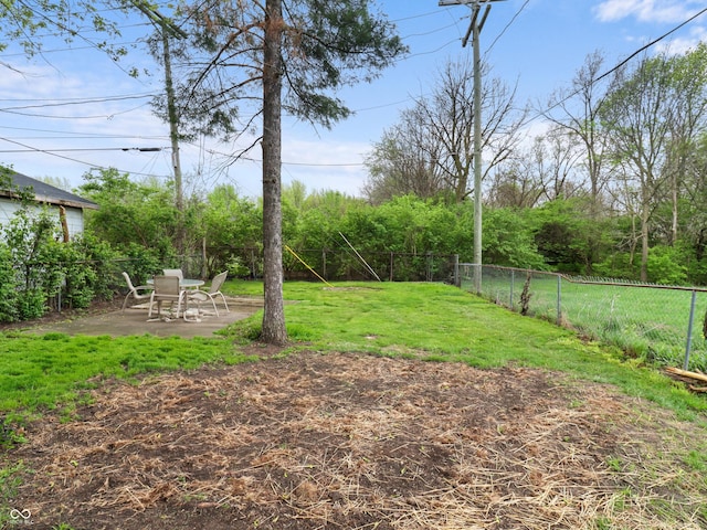 view of yard featuring a patio and a fenced backyard