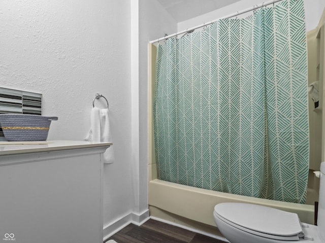 1401 E 24th St, Muncie, IN 47302 - bathroom with shower / bathtub combination with curtain, wood finished floors, and vanity