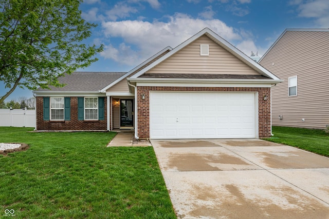 ranch-style house featuring fence, an attached garage, a front lawn, brick siding, and driveway