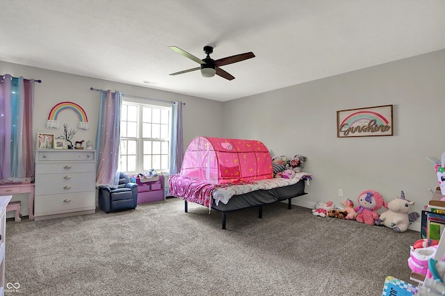 carpeted bedroom featuring a ceiling fan