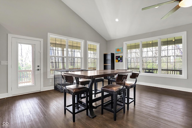 dining space featuring a ceiling fan, dark wood-style flooring, baseboards, high vaulted ceiling, and recessed lighting