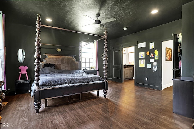 bedroom with recessed lighting, baseboards, visible vents, and wood finished floors