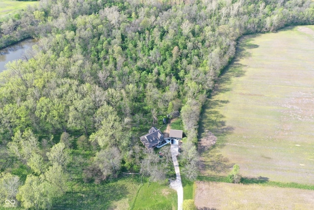 aerial view with a water view, a rural view, and a forest view