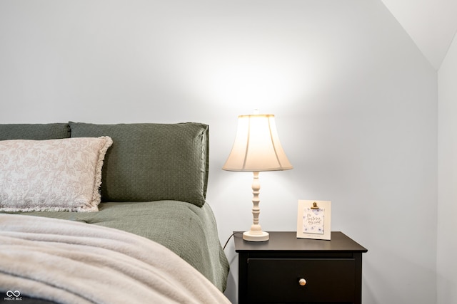 bedroom with vaulted ceiling