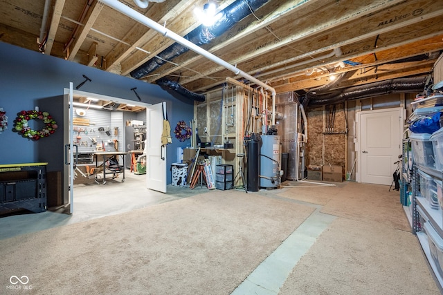 unfinished basement featuring heating unit and water heater