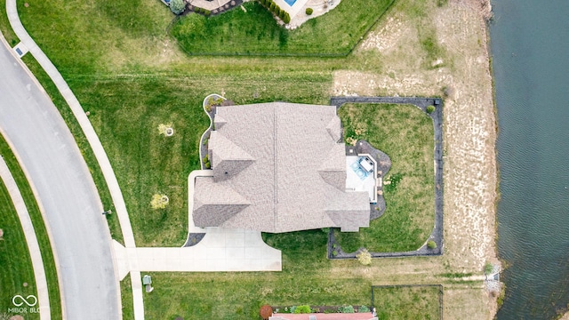 drone / aerial view with a water view