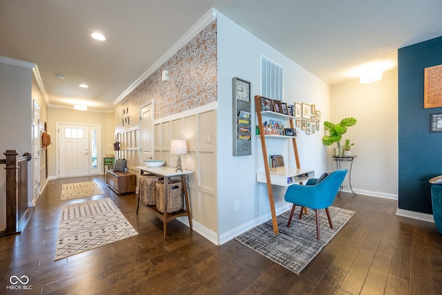 entryway featuring baseboards, ornamental molding, recessed lighting, and hardwood / wood-style floors