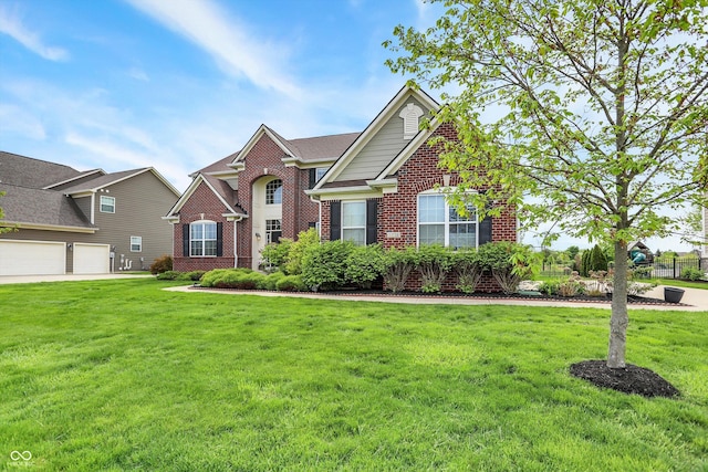 view of front of home with brick siding and a front yard