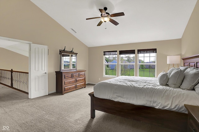 bedroom featuring light colored carpet, high vaulted ceiling, baseboards, and ceiling fan
