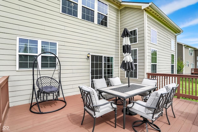 deck featuring outdoor dining space