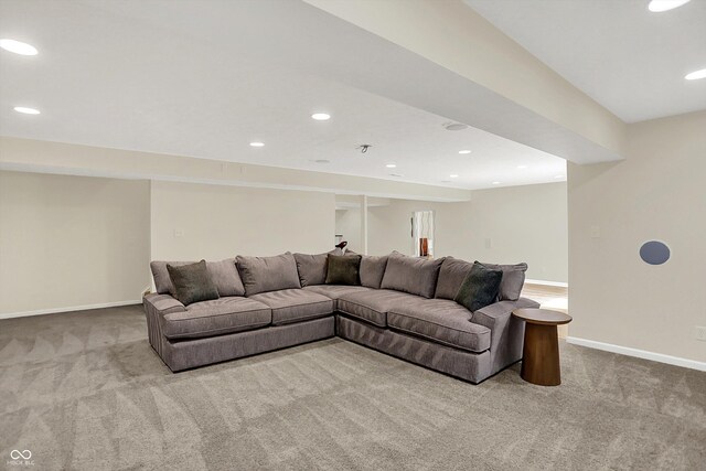 living room with carpet flooring, baseboards, and recessed lighting