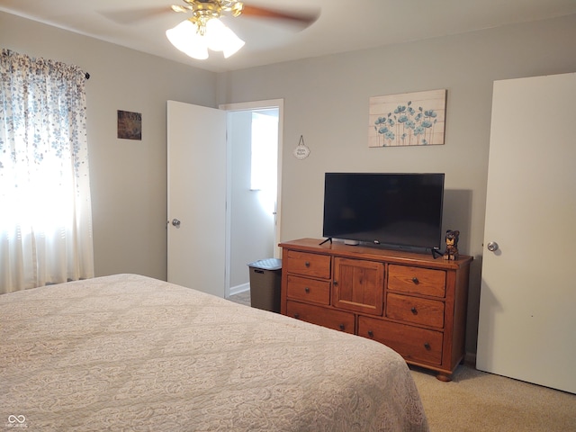 2630 Wedgewood Dr, Columbus, IN 47203 - bedroom featuring ceiling fan and light colored carpet