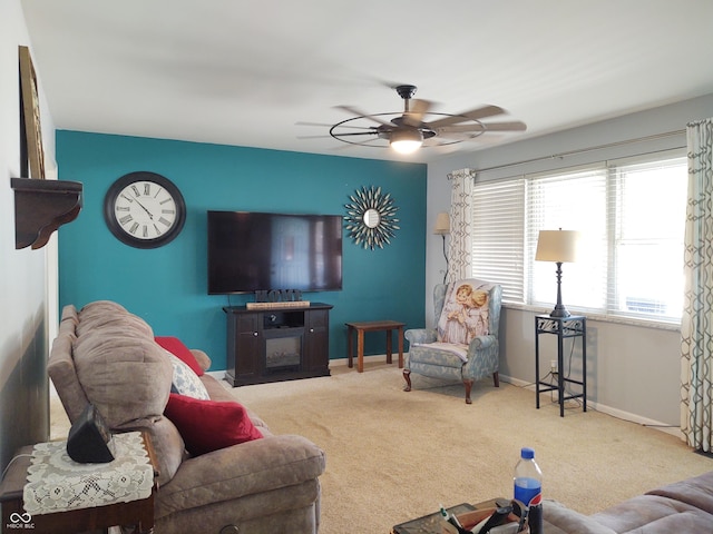 2630 Wedgewood Dr, Columbus, IN 47203 - living room with carpet floors, baseboards, and a ceiling fan
