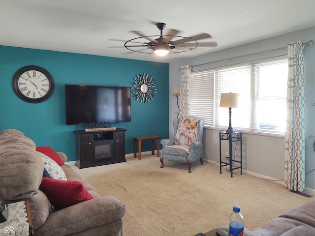 2630 Wedgewood Dr, Columbus, IN 47203 - carpeted living area featuring baseboards and a ceiling fan