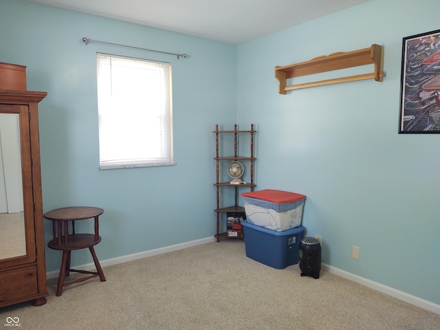 2630 Wedgewood Dr, Columbus, IN 47203 - misc room with baseboards and carpet