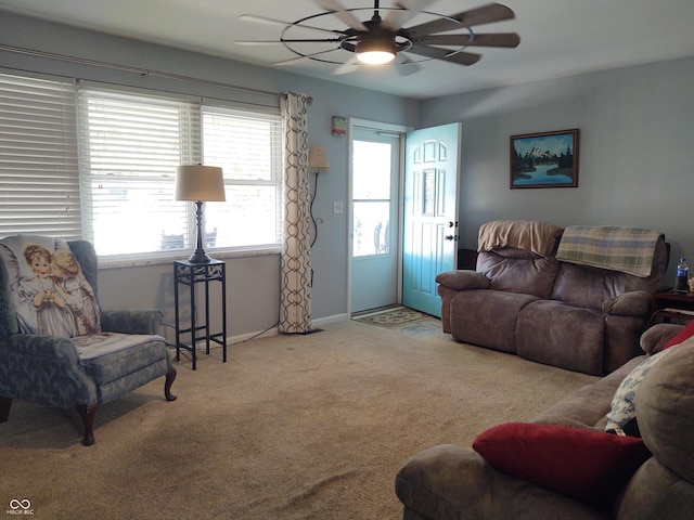 2630 Wedgewood Dr, Columbus, IN 47203 - carpeted living area featuring baseboards and a ceiling fan