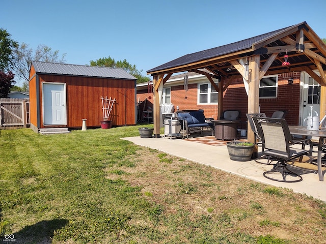 2630 Wedgewood Dr, Columbus, IN 47203 - view of yard with an outdoor structure, fence, a patio, an outdoor hangout area, and a gazebo