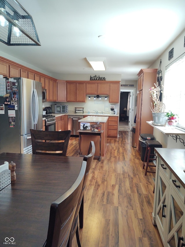 2630 Wedgewood Dr, Columbus, IN 47203 - dining space with wood finished floors