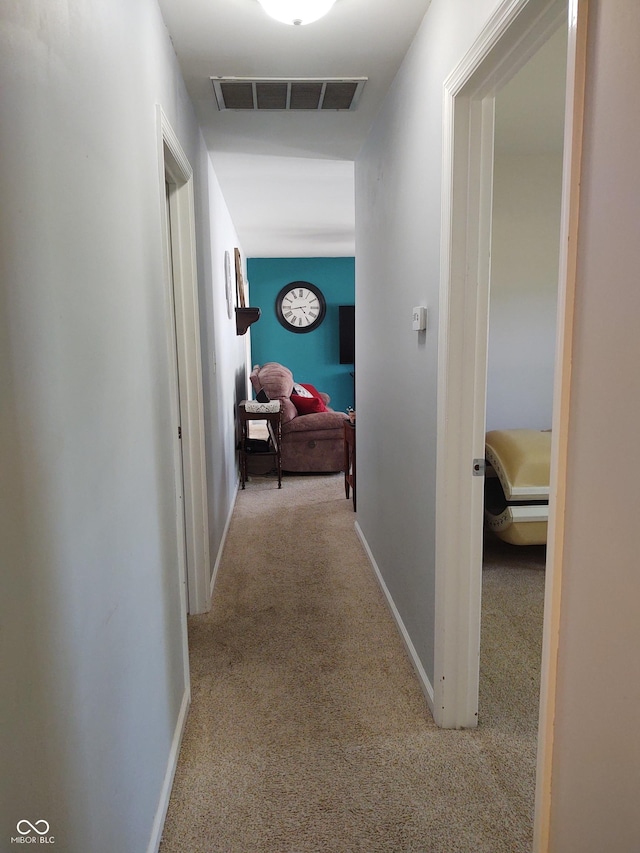 2630 Wedgewood Dr, Columbus, IN 47203 - corridor featuring carpet floors, baseboards, and visible vents