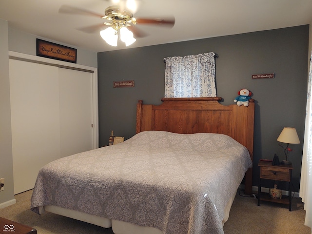 2630 Wedgewood Dr, Columbus, IN 47203 - bedroom featuring a closet, carpet flooring, baseboards, and a ceiling fan