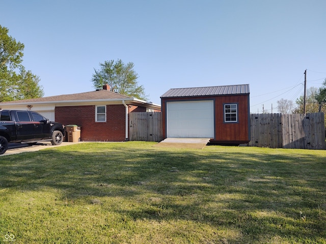 2630 Wedgewood Dr, Columbus, IN 47203 - view of yard featuring fence and an outdoor structure