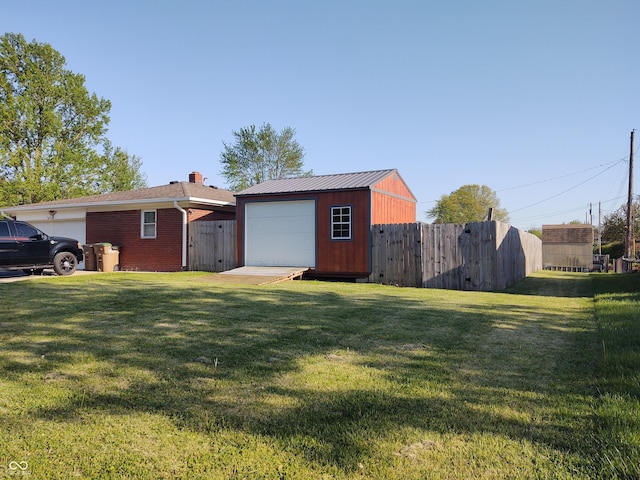 2630 Wedgewood Dr, Columbus, IN 47203 - exterior space with fence and an outbuilding