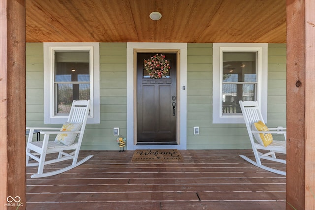 entrance to property with a porch