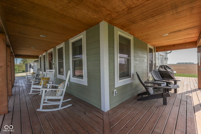 wooden deck featuring a porch