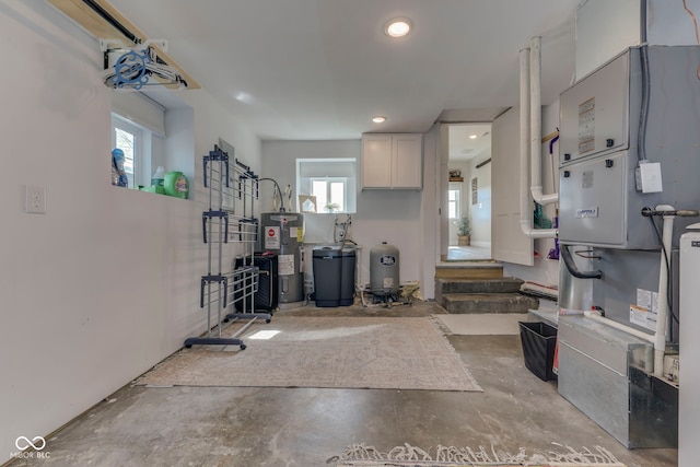 utilities featuring heating unit and water heater