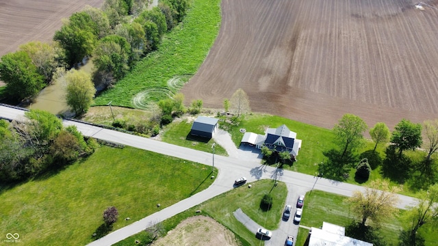 birds eye view of property featuring a rural view