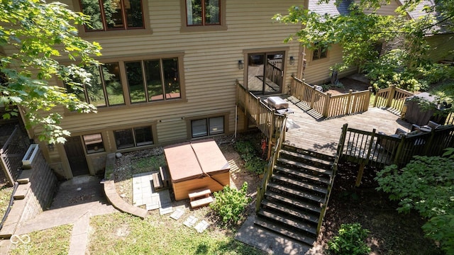 2450 S US-421, Zionsville, IN 46077 - rear view of property featuring a wooden deck, a hot tub, and stairway