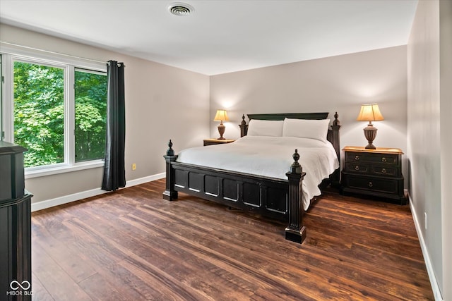 2450 S US-421, Zionsville, IN 46077 - bedroom with baseboards, visible vents, and wood finished floors