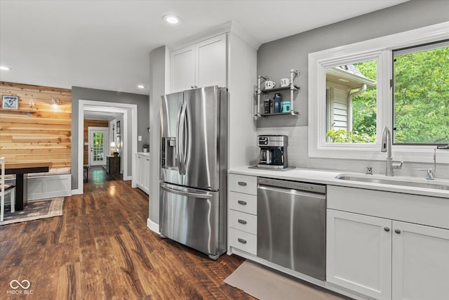 2450 S US-421, Zionsville, IN 46077 - kitchen with dark wood-style flooring, light countertops, a sink, backsplash, and stainless steel appliances
