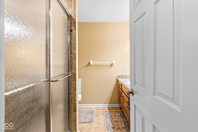 2450 S US-421, Zionsville, IN 46077 - bathroom featuring vanity, baseboards, toilet, and a shower stall