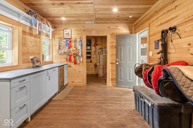 2450 S US-421, Zionsville, IN 46077 - kitchen with wood ceiling, wooden walls, and light wood-type flooring