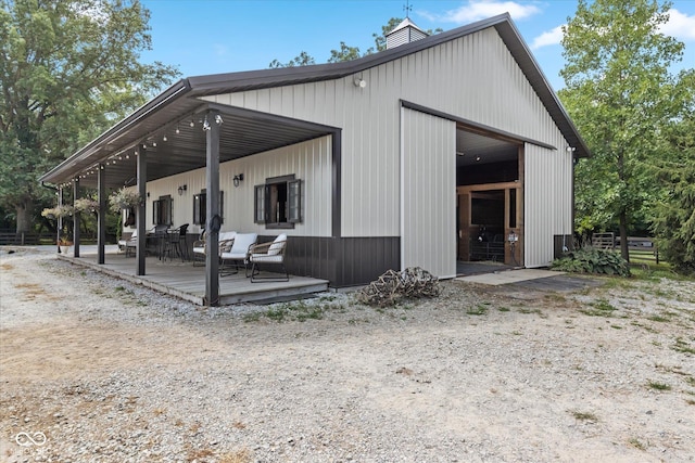 2450 S US-421, Zionsville, IN 46077 - exterior space with a detached garage and a chimney