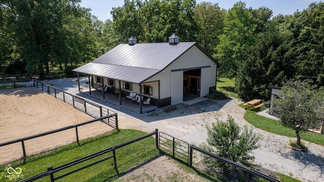 2450 S US-421, Zionsville, IN 46077 - exterior space with metal roof, a standing seam roof, and fence