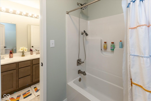 full bath with double vanity and shower / tub combo