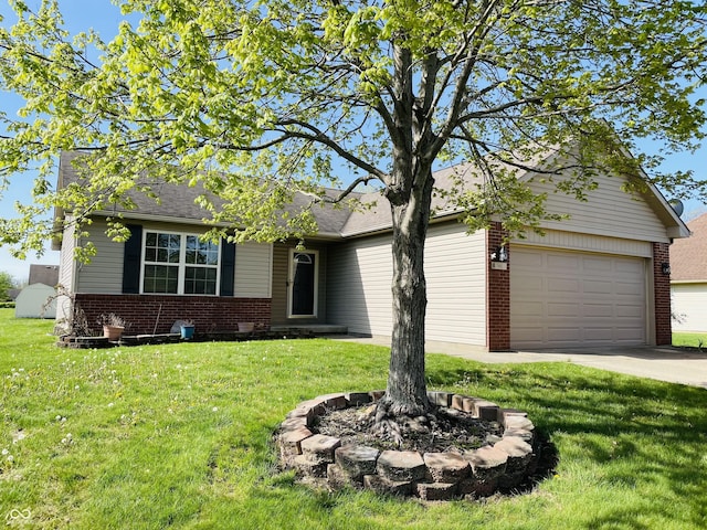 view of front facade with concrete driveway, brick siding, an attached garage, and a front lawn