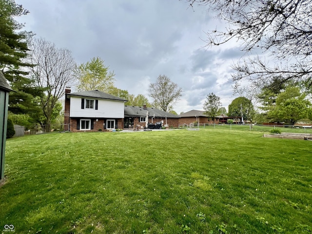 view of yard with fence