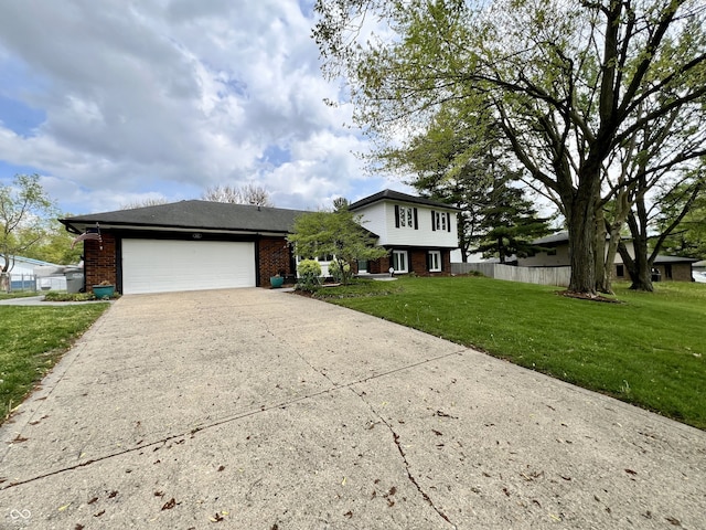split level home featuring driveway, a garage, brick siding, fence, and a front lawn