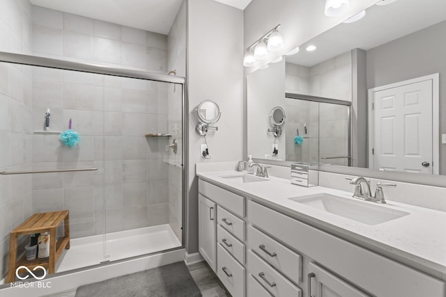 75 Hovden Dr, Cicero, IN 46034 - bathroom featuring double vanity, a sink, a stall shower, and recessed lighting