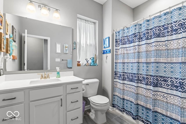 75 Hovden Dr, Cicero, IN 46034 - bathroom featuring toilet, a shower with shower curtain, and vanity