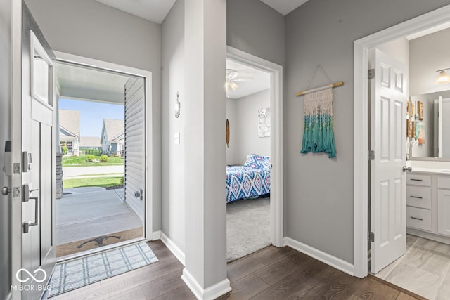 75 Hovden Dr, Cicero, IN 46034 - entryway featuring a ceiling fan, baseboards, and wood finished floors