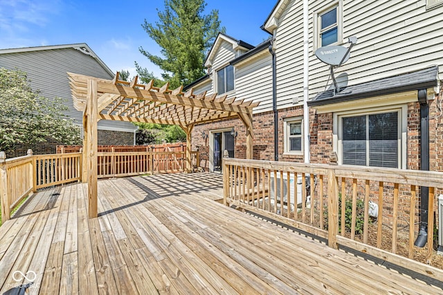 wooden terrace with a pergola