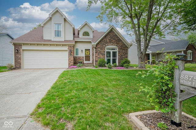 view of front of property featuring brick siding, driveway, a front yard, and roof with shingles