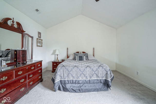 bedroom with carpet floors, baseboards, vaulted ceiling, and visible vents