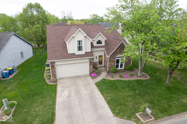 traditional-style home featuring a garage, a front lawn, stone siding, roof with shingles, and driveway