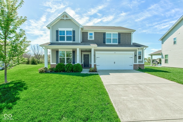 view of front of home with a garage, a front yard, brick siding, board and batten siding, and driveway