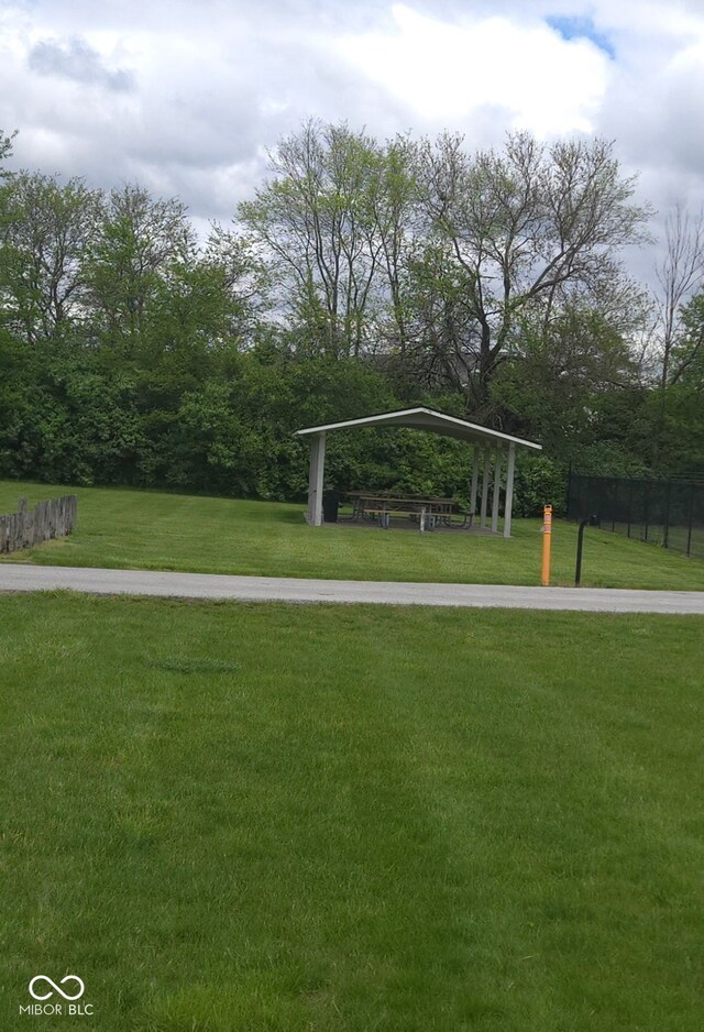745 S Summerhaven Ct, New Palestine, IN 46163 - surrounding community with a carport, fence, a lawn, and a gazebo
